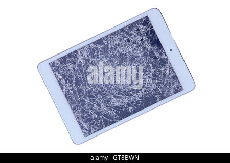 Tablet with a shattered glass screen rendered unusable after an accident or fall viewed isolated on white from above, diagonal w Stock Photo