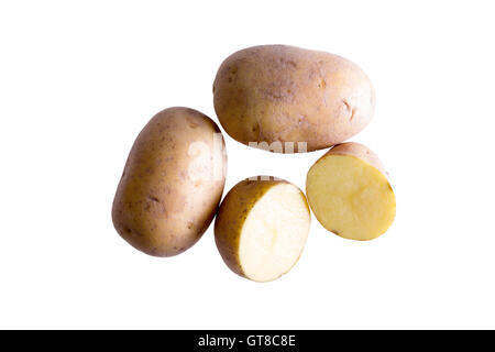 Still Life of Two Whole Golden Potatoes with One Cut in Half Isolated on White Background Stock Photo