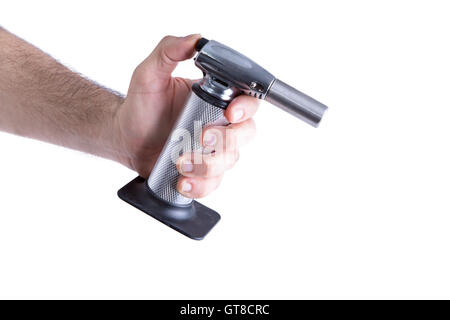 Close up Man Hand Holding Butane Kitchen Torch, Ready to Ignite.Isolated on White Background. Stock Photo