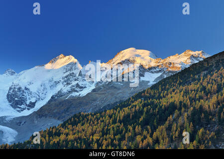 Sunrise in Mountains, Morteratsch Glacier, Bernina Pass, Pontresina, Canton of Graubunden, Switzerland Stock Photo