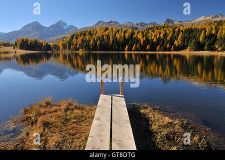 Wooden Jetty on Lake Staz, St. Moritz, Canton of Graubunden, Switzerland Stock Photo