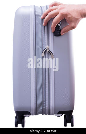 Man displaying a TSA compliant security lock with a dual key-combination lock mechanism allowing the USA Department of Homeland Stock Photo