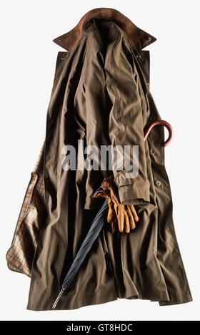 Brown overcoat with black umbrella and leather gloves on white background Stock Photo