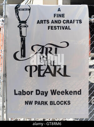 A poster advertises the annual Art in the Pearl festival over the 2016 Labor Day weekend in Portland, Oregon Stock Photo