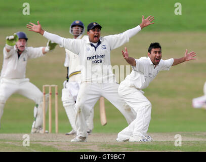 Adnan Akram of Wanstead (right) leads the appeals as C Mudalige is trapped lbw - Ardleigh Green CC vs Wanstead CC - Essex Cricket League - 01/09/07 .. Stock Photo