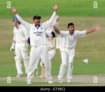 Adnan Akram of Wanstead (right) and M Chowdhury appeal for the wicket of M Clarke - Ardleigh Green CC vs Wanstead CC - Essex Cricket League - 01/09/07 .. Stock Photo