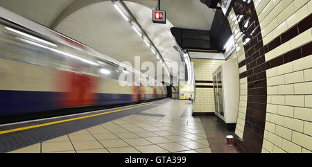 View of London Underground Platform at Edgware Road with Train Leaving, London, England, UK Stock Photo