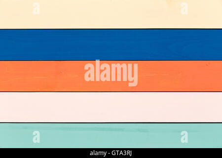 Colorful stained wood background in different pastel shades for each plank in a decorating or creativity concept Stock Photo