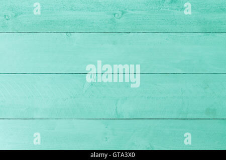 Pastel green stained wood background texture with horizontal parallel boards, woodgrain and copy space, full frame Stock Photo