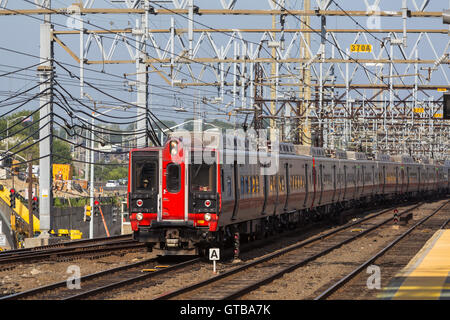 A southbound Metro-North New Haven line commuter train arrives at the station in Stamford, Connecticut. Stock Photo