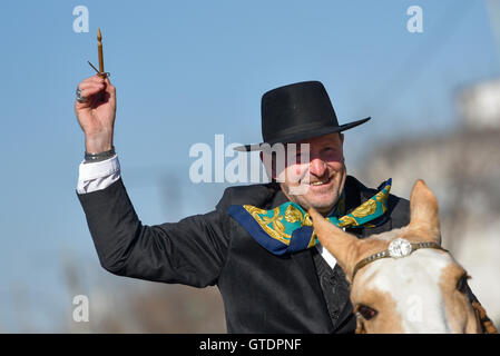 Buenos Aires, Argentina. 12 Jun 2016. A Gaucho rides his horse as he participates in the Corrida de sortija game. Stock Photo