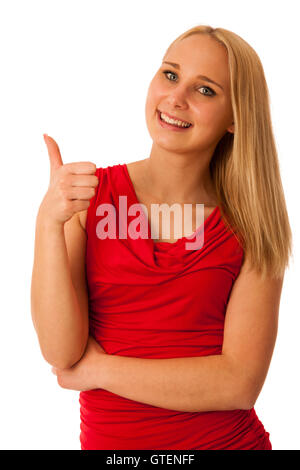 Business woman gestures success with thumbs up Stock Photo