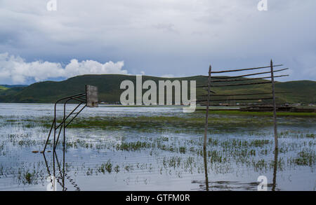 Flooded basketball court Stock Photo