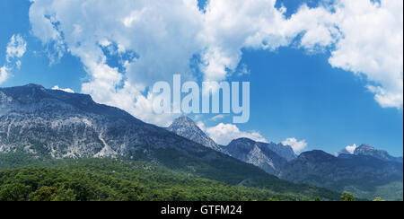 Beautiful cloudscape over the mountain hills. Stock Photo
