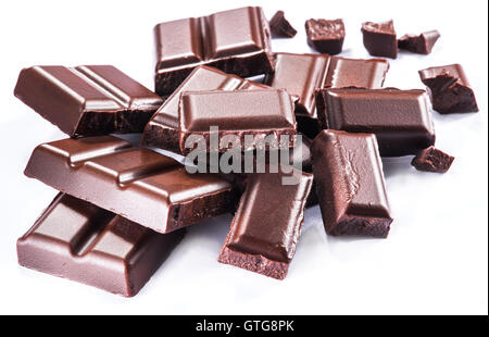 Pieces of chocolate bar isolated on a white background. Stock Photo