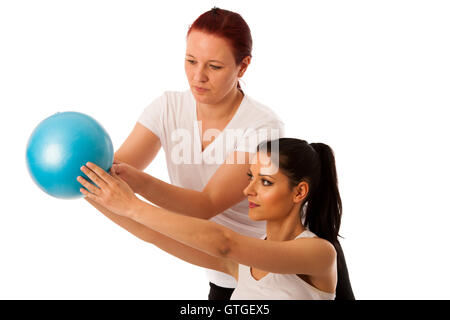 Physiotherapy - therapist doing arm  excercises for improving coordination with a patient to recover  after injury Stock Photo