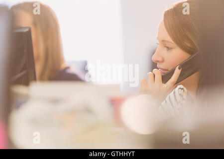 Businesswoman talking on telephone Stock Photo