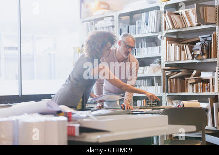 Designers brainstorming in office Stock Photo