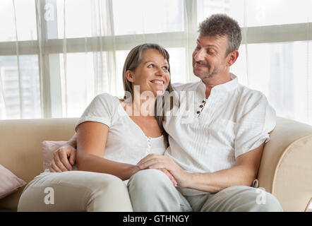 happy middle aged couple looking at each others Stock Photo