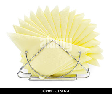 Table napkin holder with yellow napkins isolated on white background. Pile of napkins Stock Photo