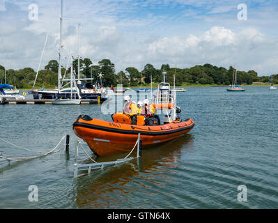 The RNLI launching at boat at Lymington, Hampshire, England, UK. Stock Photo