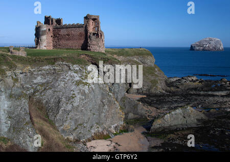 A landscape daytime view of Tantallon Castle and Bass Rock near North Berwick in Scotland Stock Photo