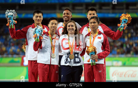 Great Britain's Libby Clegg and guide Chris Clarke celebrate with their Gold medals won in the Women's 100m - T11 during the second day of the 2016 Rio Paralympic Games in Rio de Janeiro, Brazil. Stock Photo