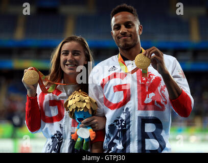 Great Britain's Libby Clegg and guide Chris Clarke celebrate with their Gold medals won in the Women's 100m - T11 during the second day of the 2016 Rio Paralympic Games in Rio de Janeiro, Brazil. Stock Photo