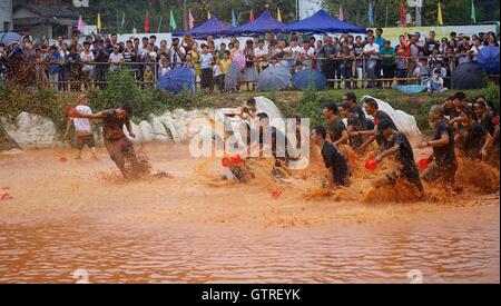 Jingdezhen, China's Jiangxi Province. 10th Sep, 2016. People play with mud during a mud festival in Jingdezhen, east China's Jiangxi Province, Sept. 10, 2016. Credit:  Hu Chenhuan/Xinhua/Alamy Live News Stock Photo