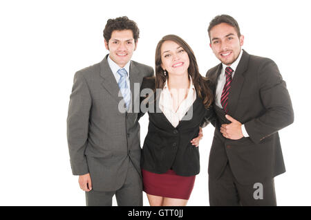 two handsome businessmen and a businesswoman in suits posing happy Stock Photo