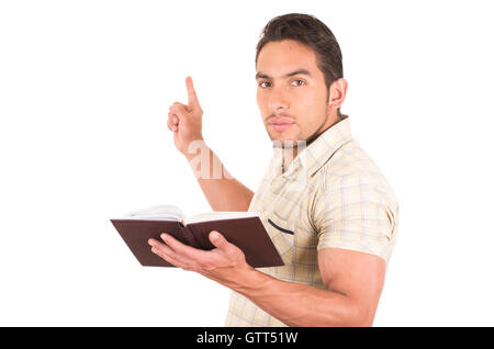young handsome male teacher holding notebook Stock Photo