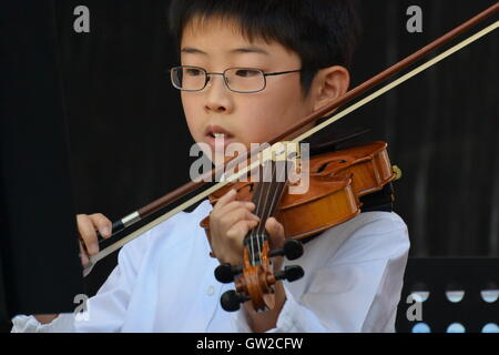 Beethovenfest Bonn, Germany, young boy playing violin on the market place Stock Photo