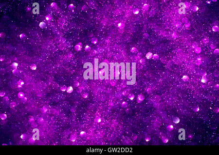 Abstract violet background with blurred glitters Stock Photo