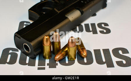 Crime Shooting concept. Handgun with bullets gun violent crime, assault. Shooting. Stock Photo