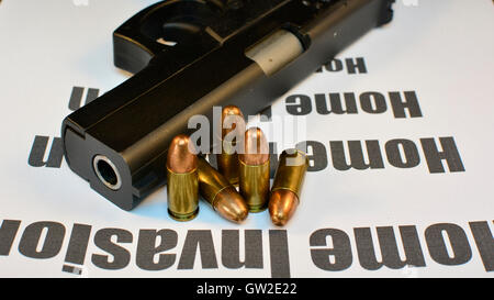 Crime Home Invasion Handgun with bullets gun violent crime, assault. Shooting. Stock Photo