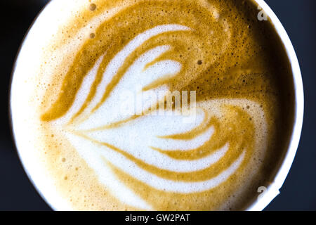 Floral decorated froth on fresh coffee England Uk Stock Photo