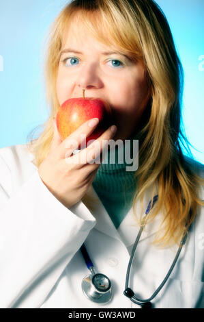 an apple a day keeps the doctor away Stock Photo
