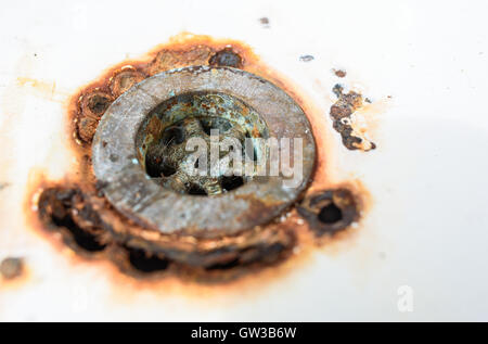 An old, rusty  enamel sink. Stock Photo
