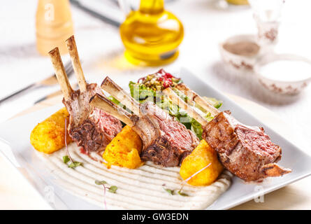 Gourmet main entree course grilled lamb steak Stock Photo