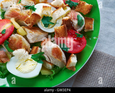 ensalada cezar con pollo- Mexico salad of romaine lettuce and croutons dressed with parmesan cheese, chicken, olive oil, egg, Stock Photo