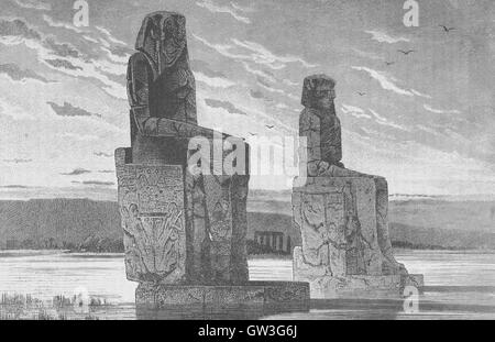 Engraved illustration of the Colossi of Memnon in Thebes, Luxor, Egypt. The Colossi of Memnon (locally known as el-Colossat or es-Salamat) are two massive stone statues of the Pharaoh Amenhotep III, who reigned in Egypt during Dynasty XVIII.  Image sourced from Cassell's Illustrated Universal History (1893). Stock Photo