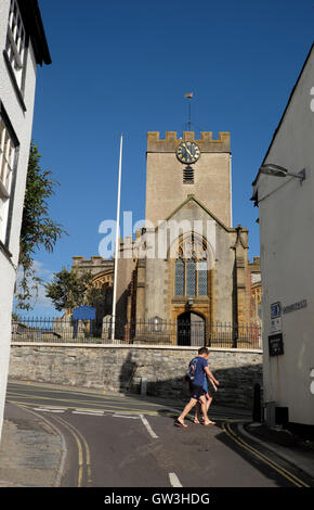 A view up Monmouth Street of St. Michael's Parish Church, Lyme Regis, Dorset, England UK    KATHY DEWITT