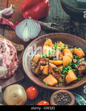 Pork and potato stew rustic style Stock Photo