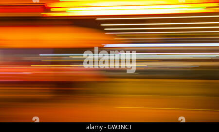 Neon lights at night in the French Quarter of New Orleans create an abstract background of color Stock Photo