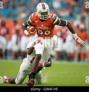 Miami tight end David Njoku runs a drill at the NFL football scouting ...