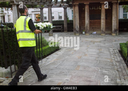 London, UK. 11th Sep, 2016. A man places wreath at the London memorial to the British victims of the September 11 attacks in New York and Washington DC Credit:  amer ghazzal/Alamy Live News