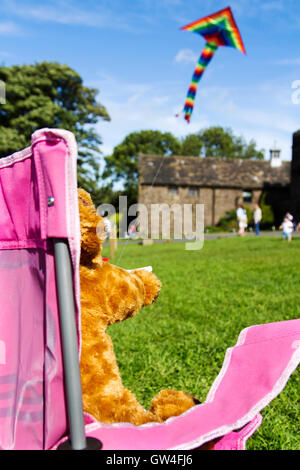 Preston, UK. 11th September, 2016. The Hoghton Tower kite festival takes place over the famous castle turrets as giant kites take to the air. Two & four line stunt kites including a giant octopus and 'Tom & Jerry' flew gracefully in the sunshine as the children looked on in amazement. This event drew hundreds of visitors who were blessed with a lovely warm sunny day to picnic in the grounds and watch the giant inflatables. Credit:  Cernan Elias/Alamy Live News Stock Photo