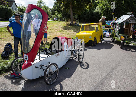 Cookham Dean, UK. 11th Sep, 2016. Custom-built go-karts lined up for inspection before the Cookham Dean Gravity Grand Prix in aid of the Thames Valley and Chiltern Air Ambulance. The Grand Prix covers a course of 700m with a descent of 32m and some karts reach speeds of 30-40 mph. Credit:  Mark Kerrison/Alamy Live News Stock Photo
