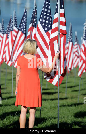 Saint Louis, MO – September 11, 2016: More than 7,000 flags with name, photo and dog tag of soldier killed defending the United States wave outside the St. Louis Art Museum in Saint Louis, Missouri Credit:  Gino's Premium Images/Alamy Live News Stock Photo