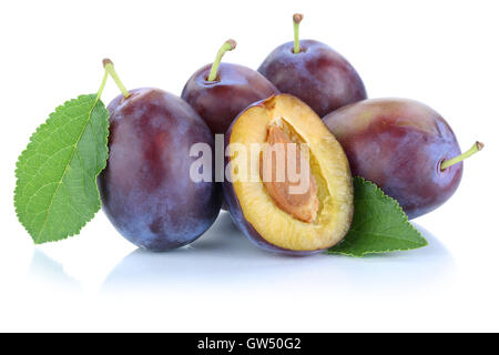 Plums plum prunes prune slice leaves fruits fruit isolated on a white background Stock Photo